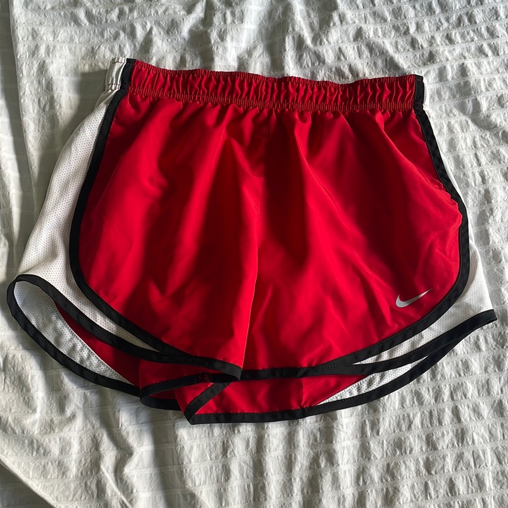 Red and white Nike shorts with built in underwear